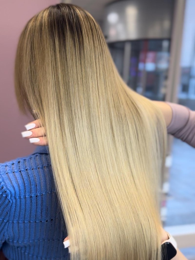 Lang, glad blond haar