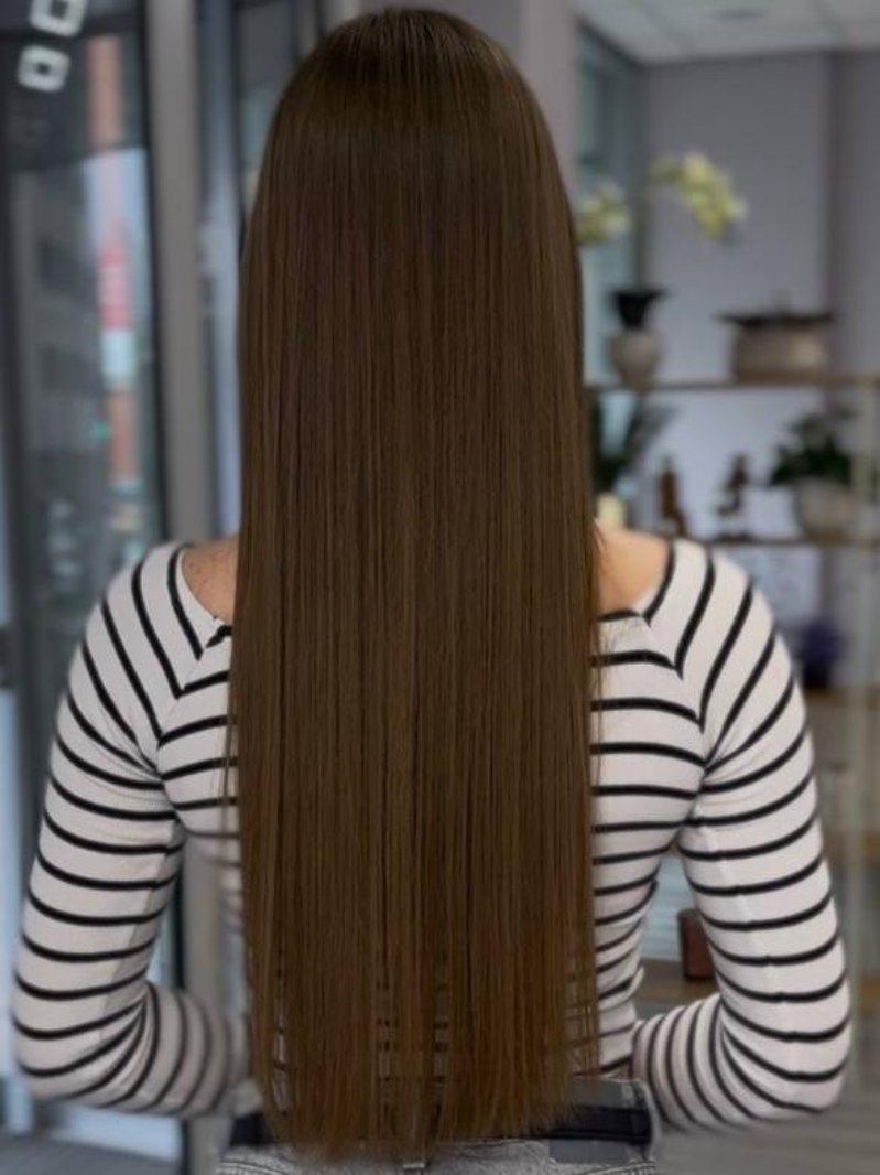 Lang, glad bruin haar