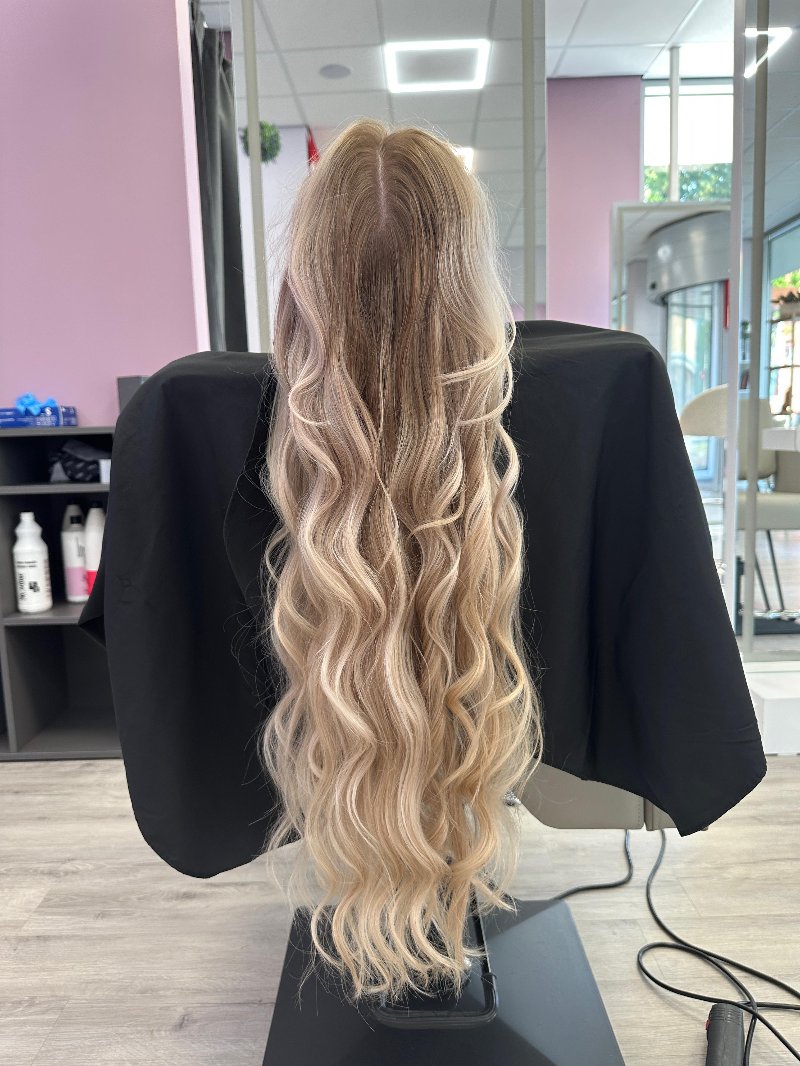 Lange blonde krullen